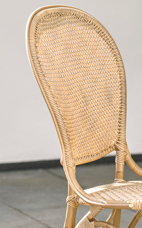 This is a close-up image of Rossini Exterior Dining Chair in antique aluminium artfibre. Detail of the woven texture and frame construction.