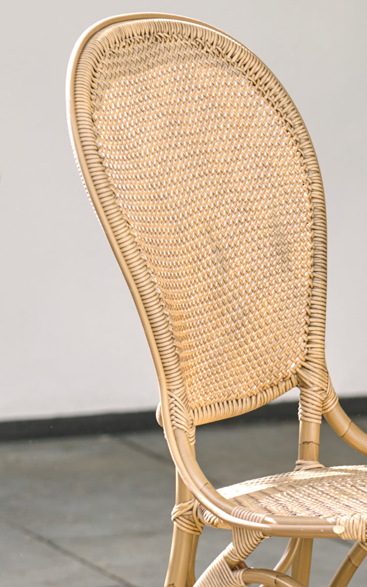 This is a close-up image of Rossini Exterior Dining Chair in antique aluminium artfibre. Detail of the woven texture and frame construction.