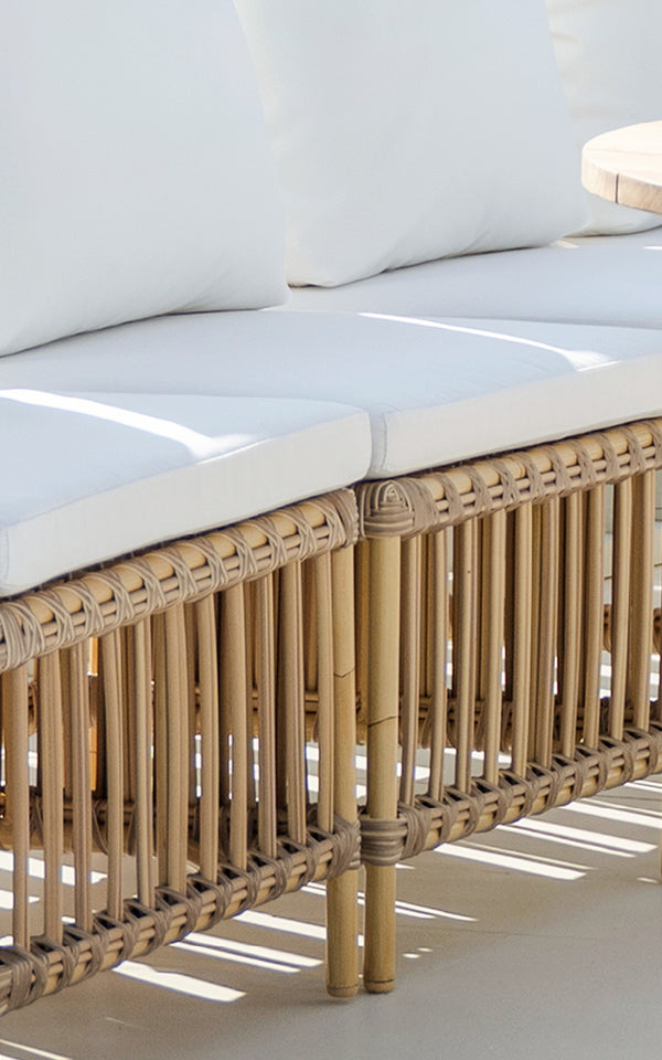 This is a close-up image of Meghan Exterior Dining Bench Center Module in natural aluminium artfibre. Detail of the rod back panel.