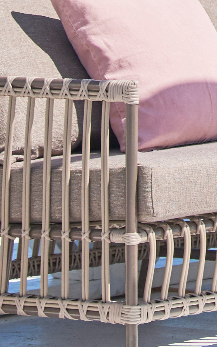 This is a close-up image of Caroline Exterior Sofa in moccaccino Aluminium ArtFibre.