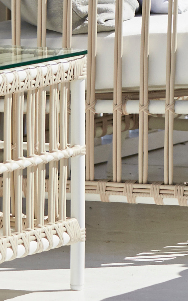 This is a close-up image of Caroline Exterior Table in dove White Aluminium ArtFibre.