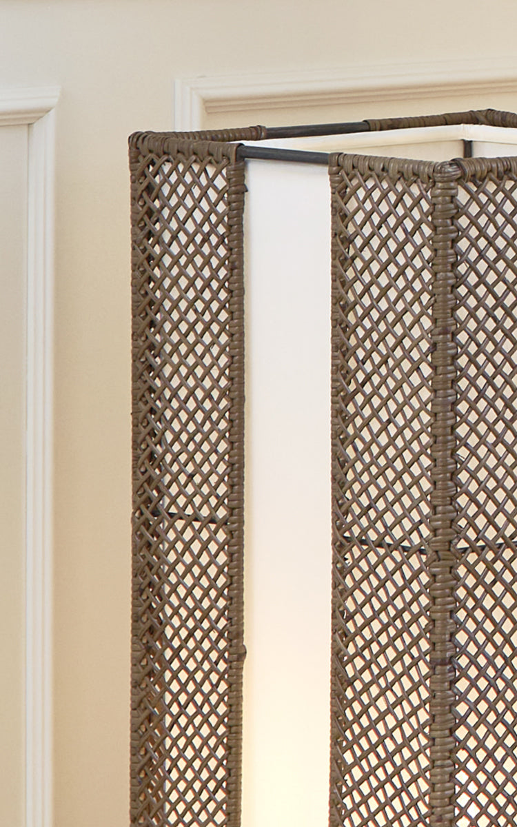 This is a close-up image of Yamakawa Lampshade | 75 cm in hazelnut rattan iron frame. Detail of the hazelnut rattan lattice weave and iron frame.