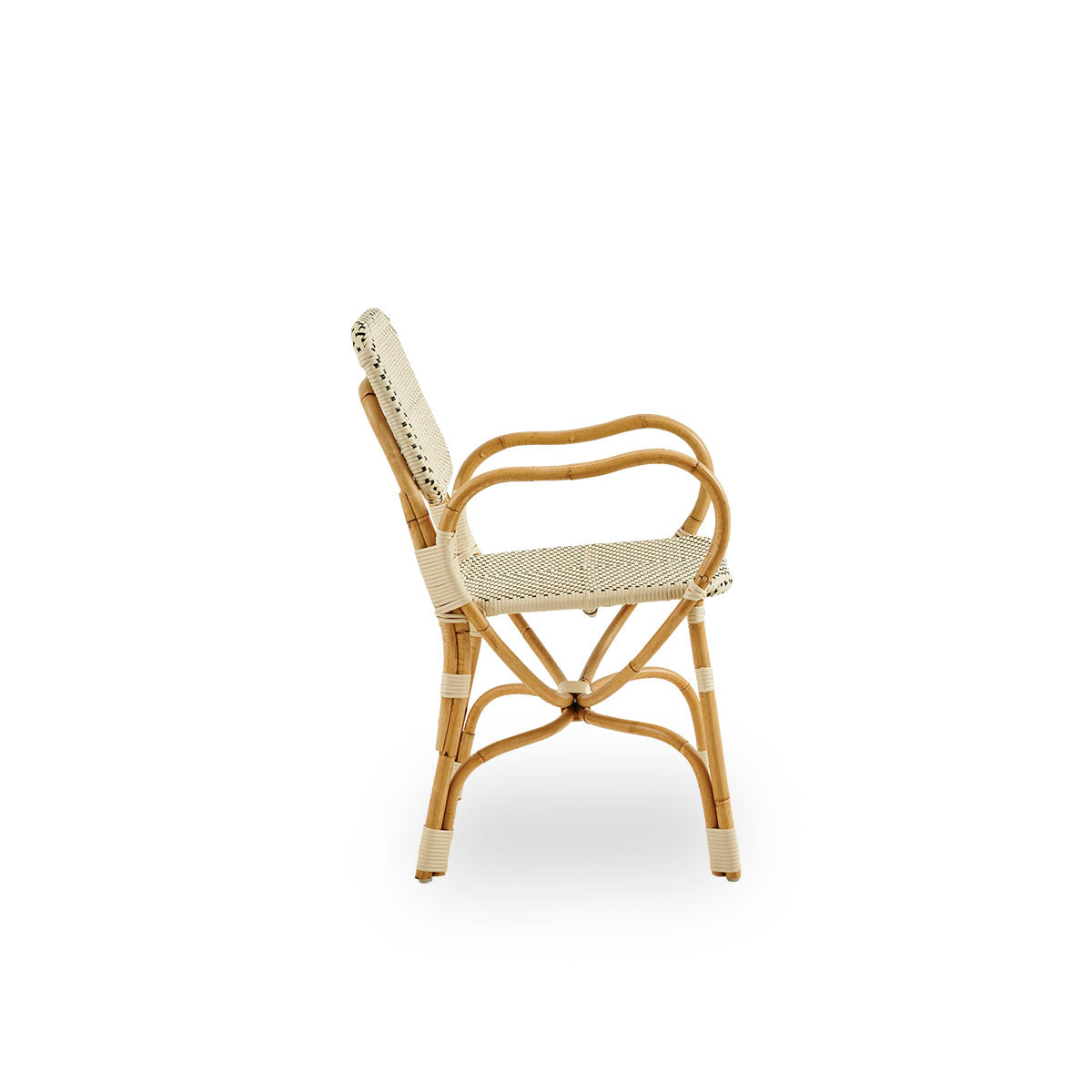 Plain side view of Bistro chair in Ivory ArtFibre weave with elegant design. Rattan frame with seat woven in ArtFibre. The curved Rattan frame under the seat extend into armrests.