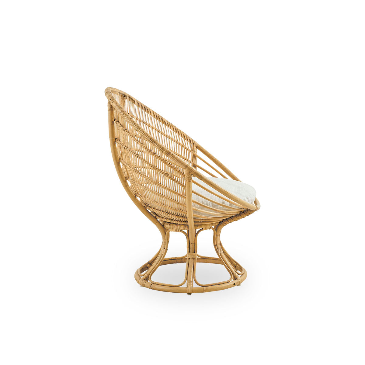 Plain side view of Luna lounge chair designed by Franco Albini & Franca Helg. Round lounge chair with seat cushion, handcrafted in high quality rattan.