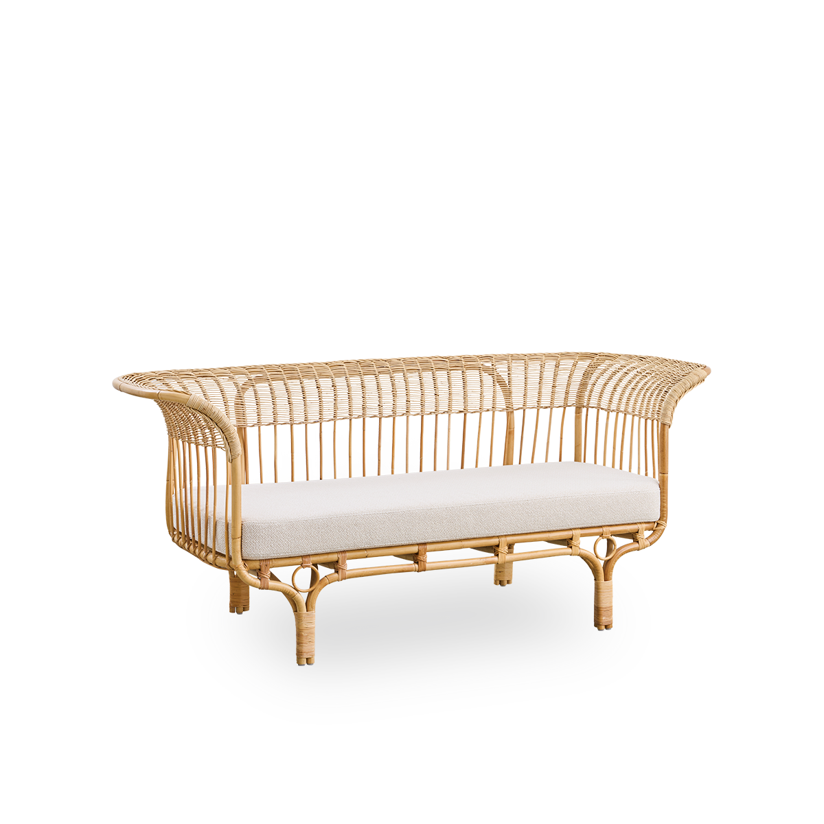 Side view of Belladonna sofa in natural rattan, designed by Franco Albini and Franca Helg. The sofa has an elegant expression with thin legs and a majestic seat with many detailed windings.