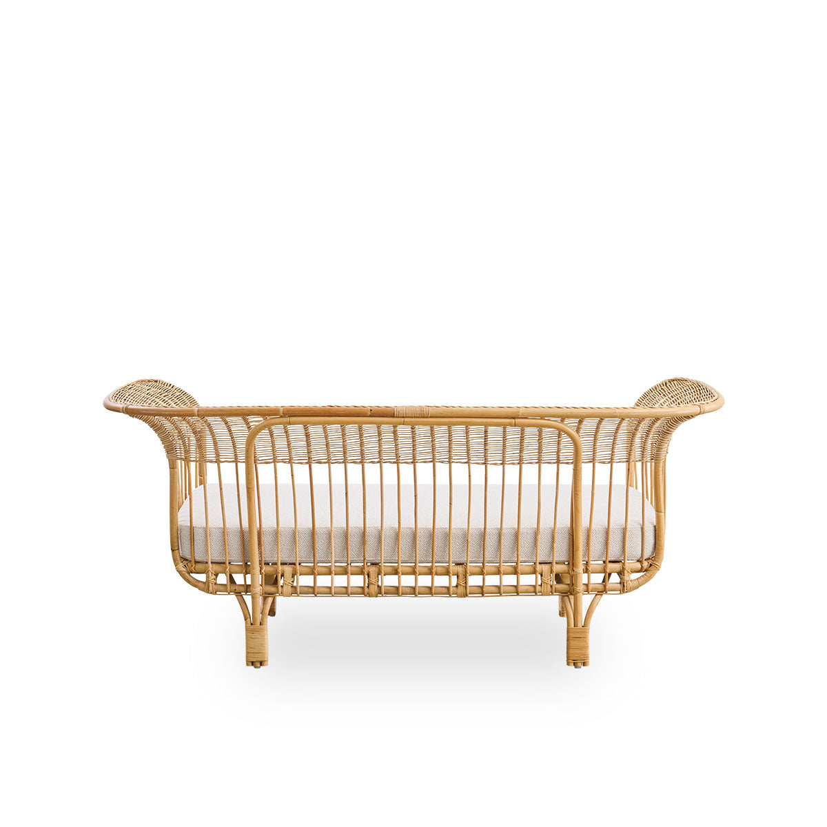 Plain back view of Belladonna sofa in natural rattan, designed by Franco Albini and Franca Helg. The sofa has an elegant expression with thin legs and a majestic seat with many detailed windings.
