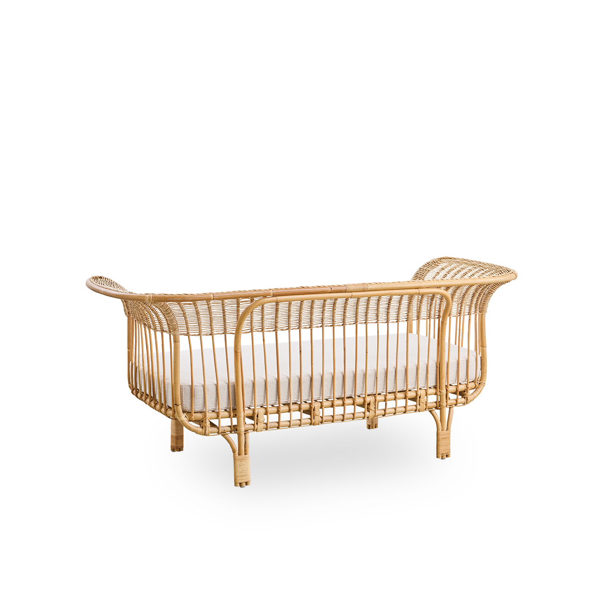 Back side view of Belladonna sofa in natural rattan, designed by Franco Albini and Franca Helg. The sofa has an elegant expression with thin legs and a majestic seat with many detailed windings.