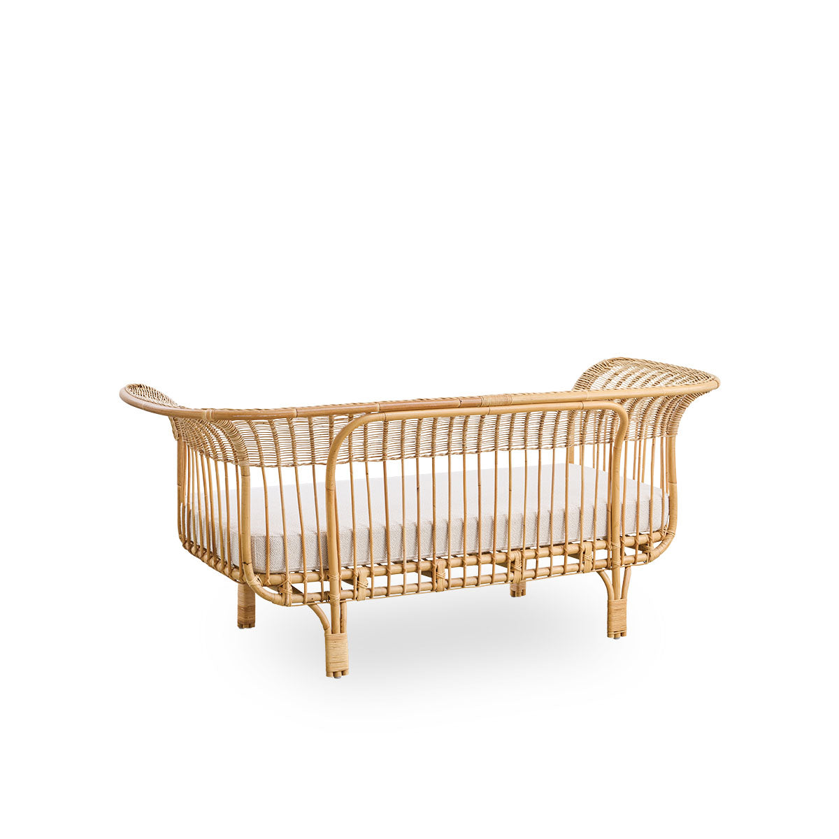 Back side view of Belladonna sofa in natural rattan, designed by Franco Albini and Franca Helg. The sofa has an elegant expression with thin legs and a majestic seat with many detailed windings.