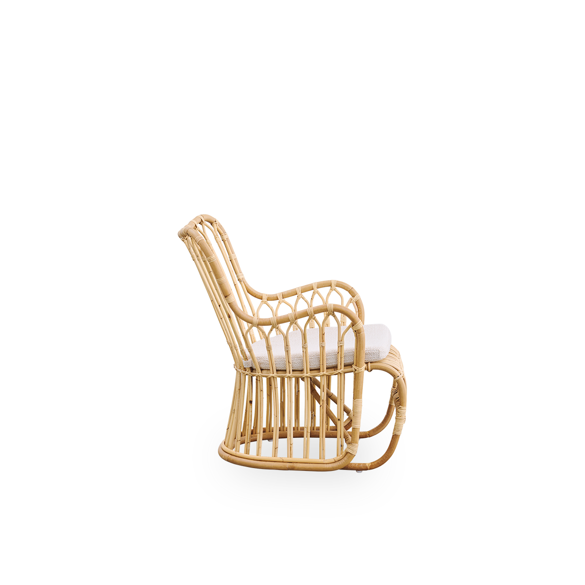 Plain side view of Tulip lounge chair designed by Tove Kindt-Larsen, with soft organic lines. Handcrafted from high-quality Indonesian rattan