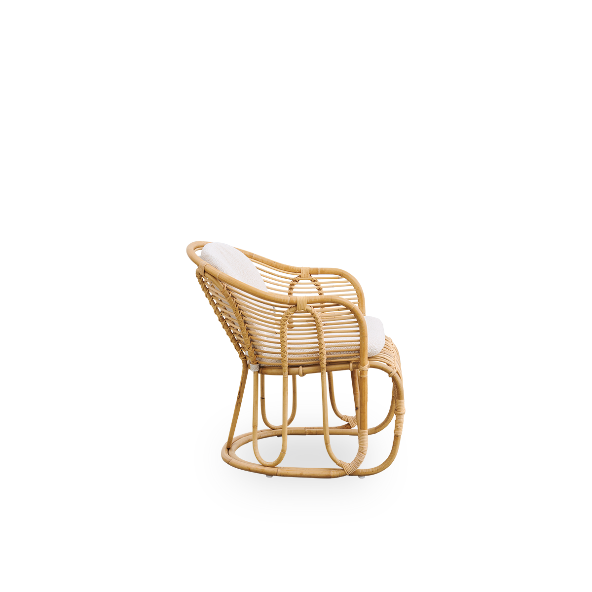 Plain side view of Swing lounge chair designed by Tove Kindt-Larsen. Handcrafted from high-quality Indonesian rattan and fitted with seat and back cushion.