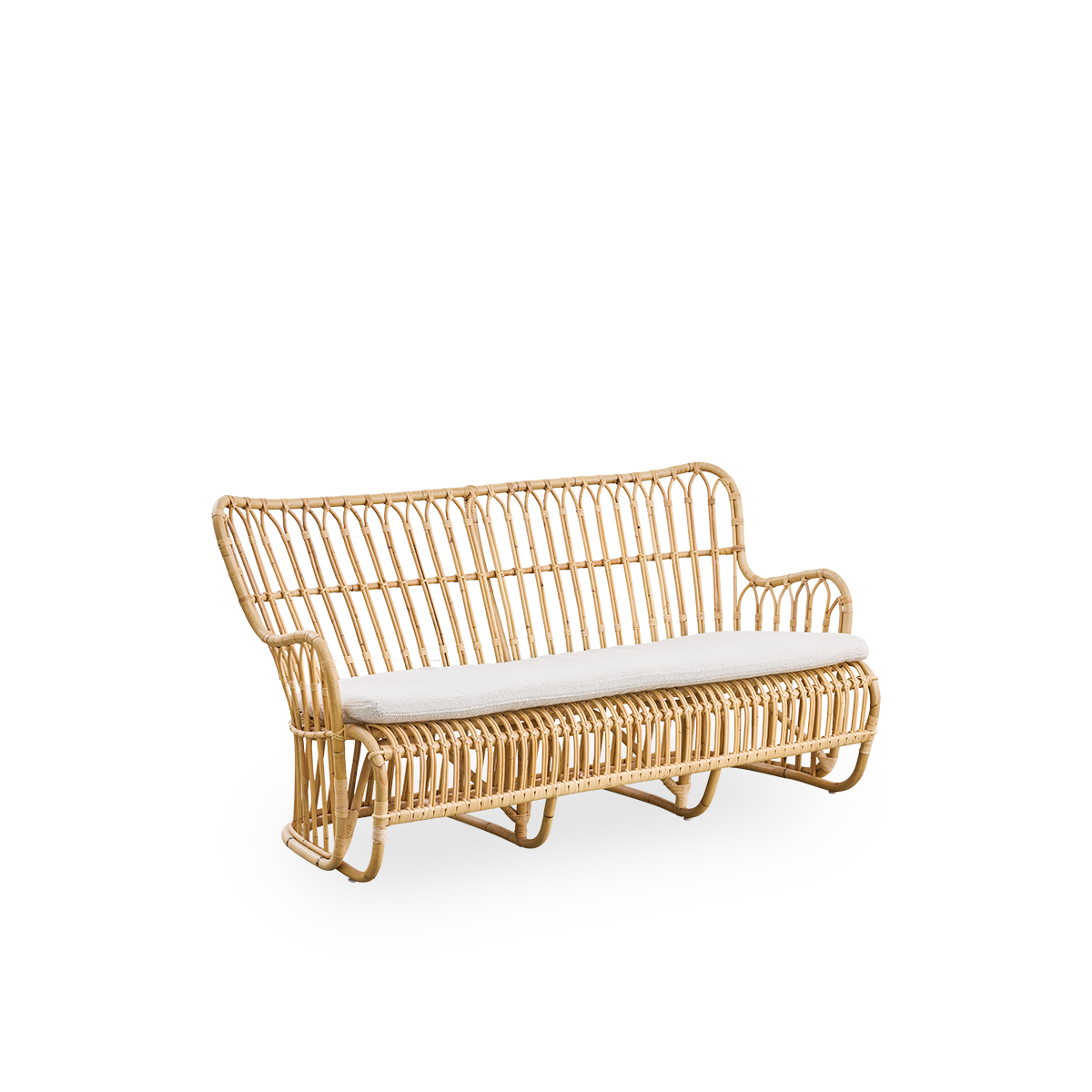 Side view of Tulip wicker sofa designed by Tove Kindt-Larsen, with soft organic lines. Handcrafted from high-quality Indonesian rattan