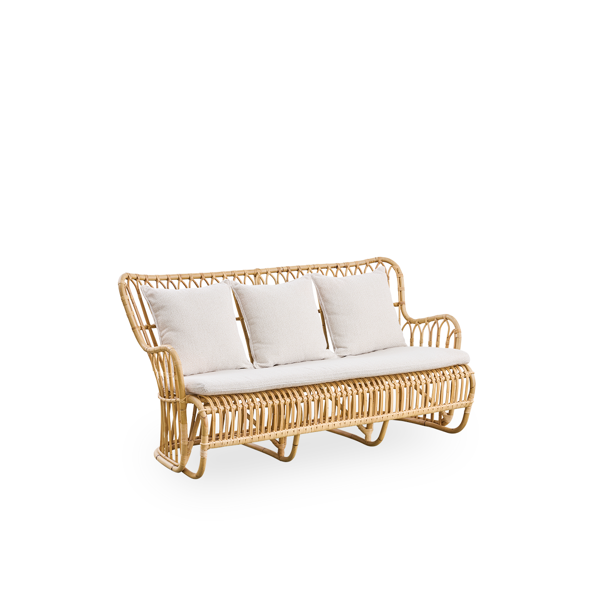 Side view of Tulip wicker sofa designed by Tove Kindt-Larsen, with soft organic lines. Handcrafted from high-quality Indonesian rattan