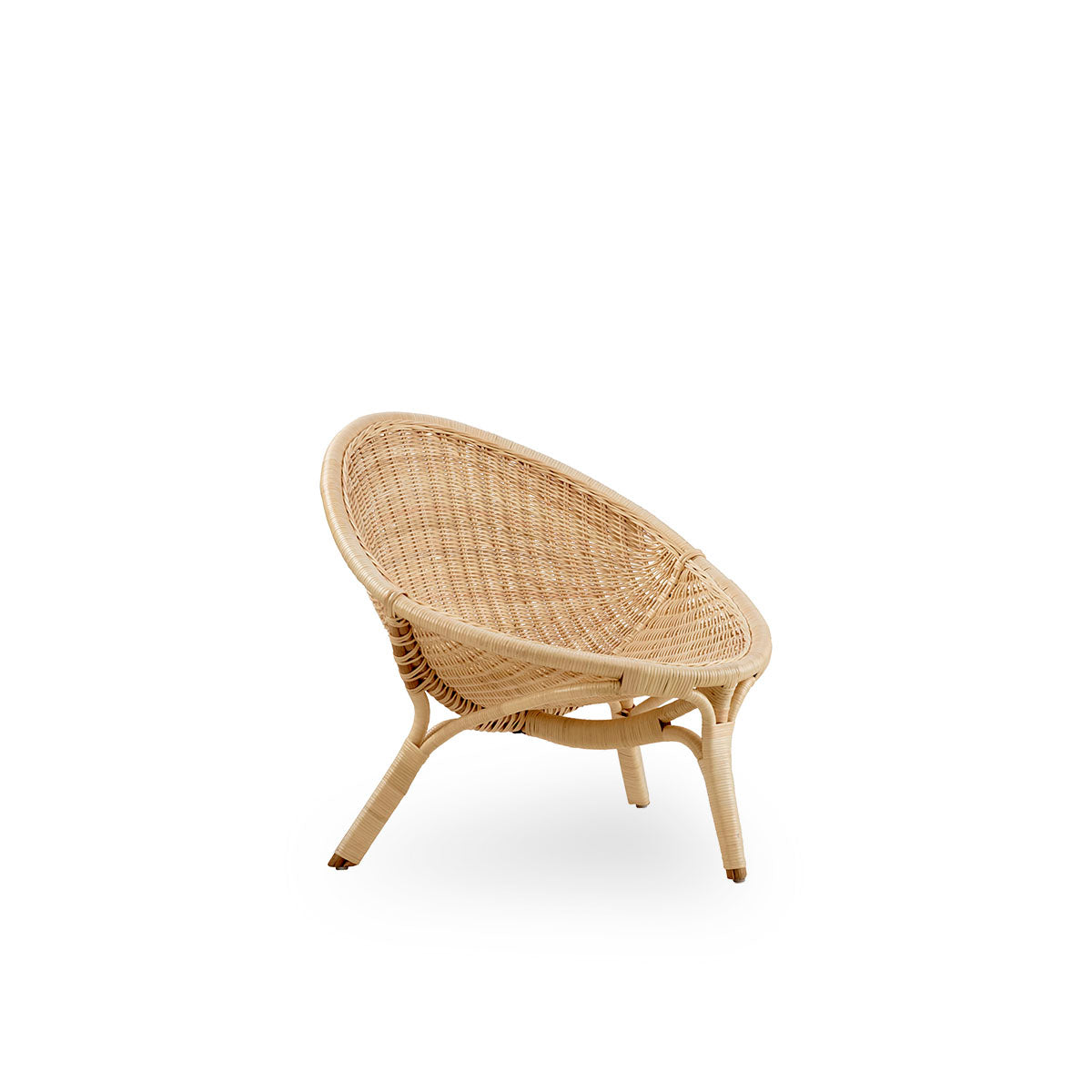 Side view of Rana lounge chair designed by Nanna Ditzel. Award-winning three-legged design, with fully woven seat, handcrafted from high-quality Indonesian rattan.