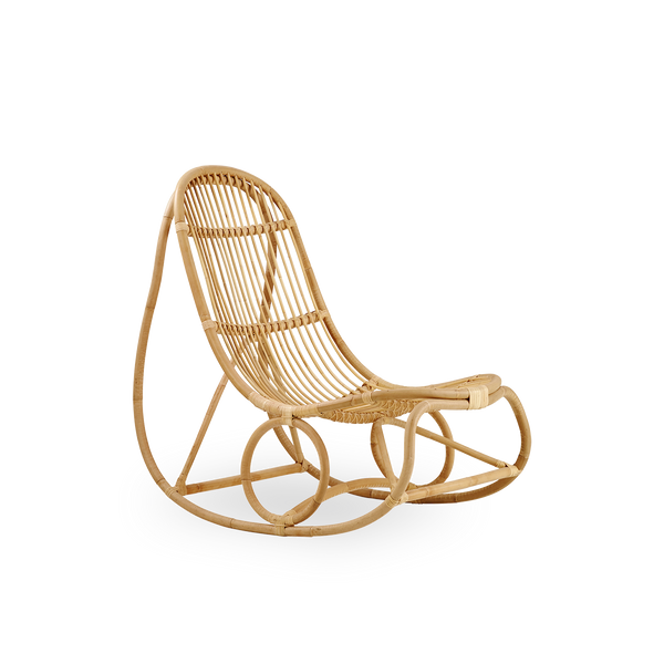 Side view of Nanny rocking chair designed by Nanna Ditzel presented in high quality natural rattan.