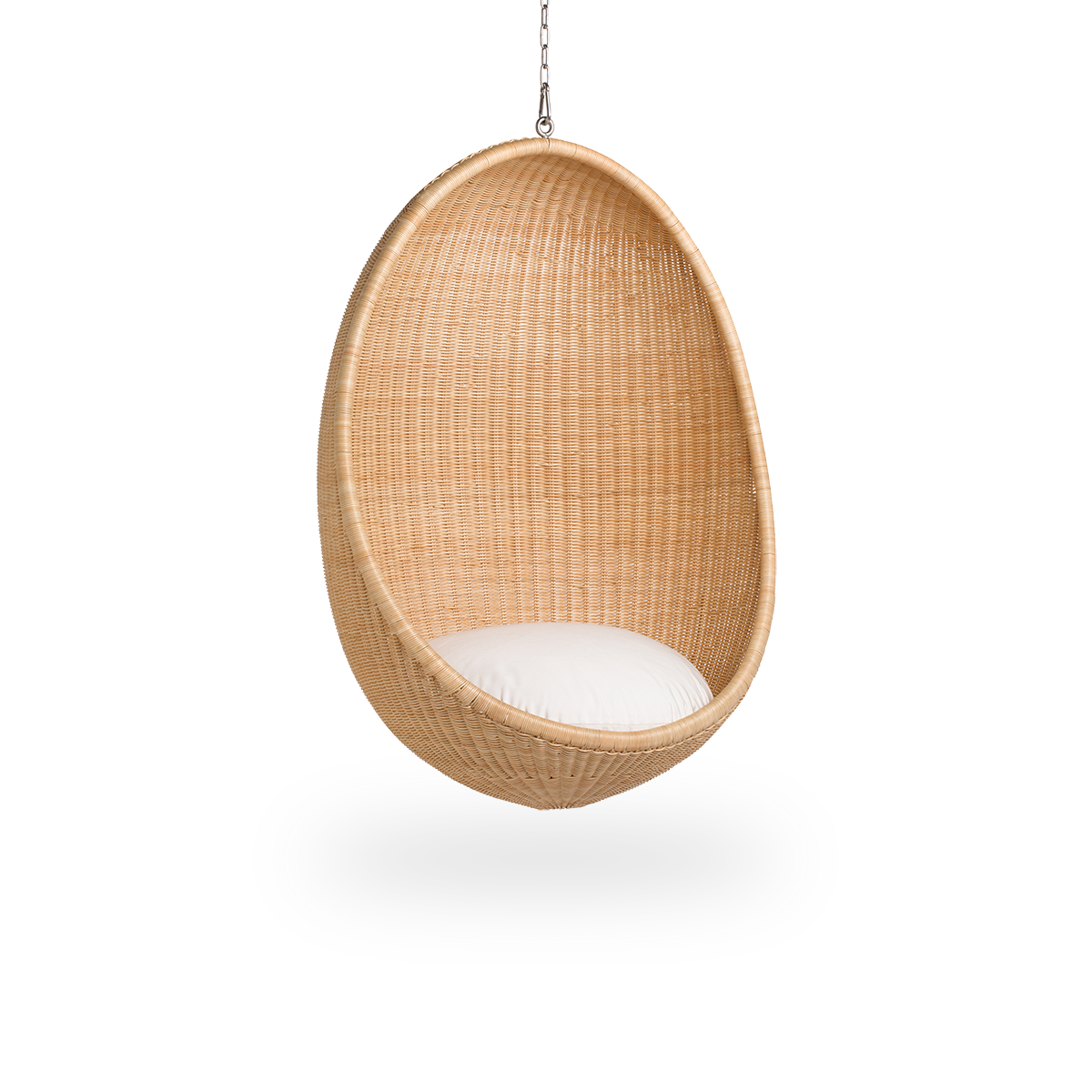 Side view of Hanging Egg, an iconic hammock chair designed by Nanna and Jørgen Ditzel. The round hanging chair is fully woven from high-quality Indonesian rattan and hangs in a metal chain.