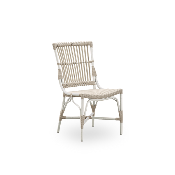 Side view of Piano outdoor dining chair. Aluminium frame with ArtFibre windings in Dove White color.  