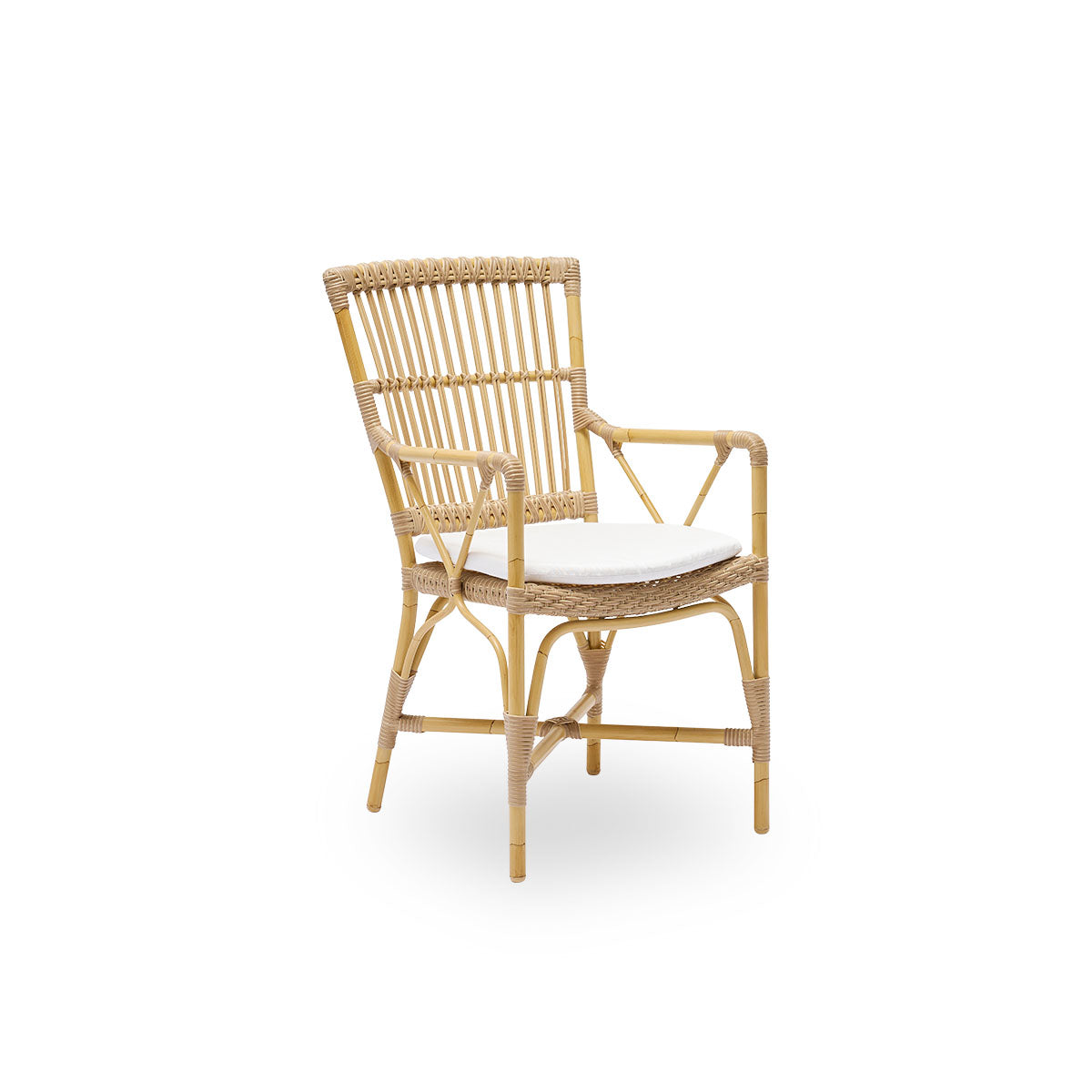 Side view of Piano outdoor armchair. Aluminium frame in natural rattan look with ArtFibre bindings. Elegant chair with high backrest and armrests. 