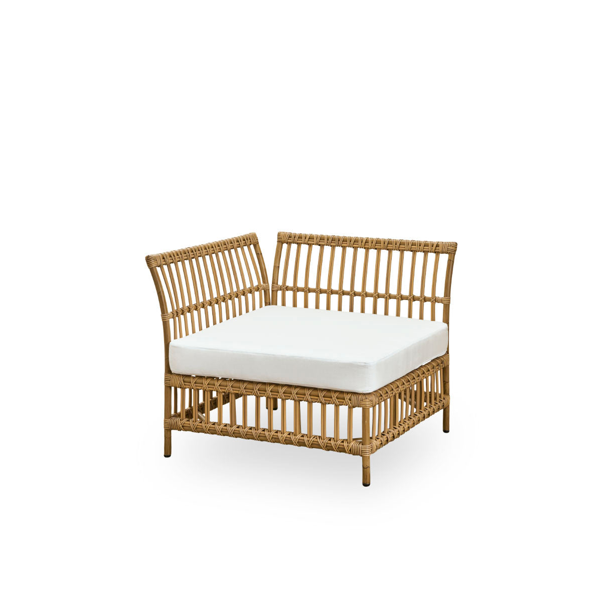 Side view of Maggie outdoor sofa corner module in Antique brown color presented with white seat and back cushion. Aluminium frame with handpainted rattan look with ArtFibre windings.