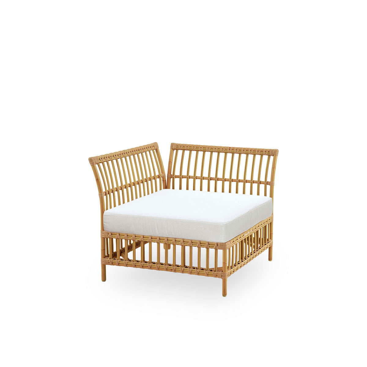 Side view of Maggie outdoor sofa corner module in Natural color presented with white seat and back cushion. Aluminium frame with handpainted rattan look with ArtFibre windings.