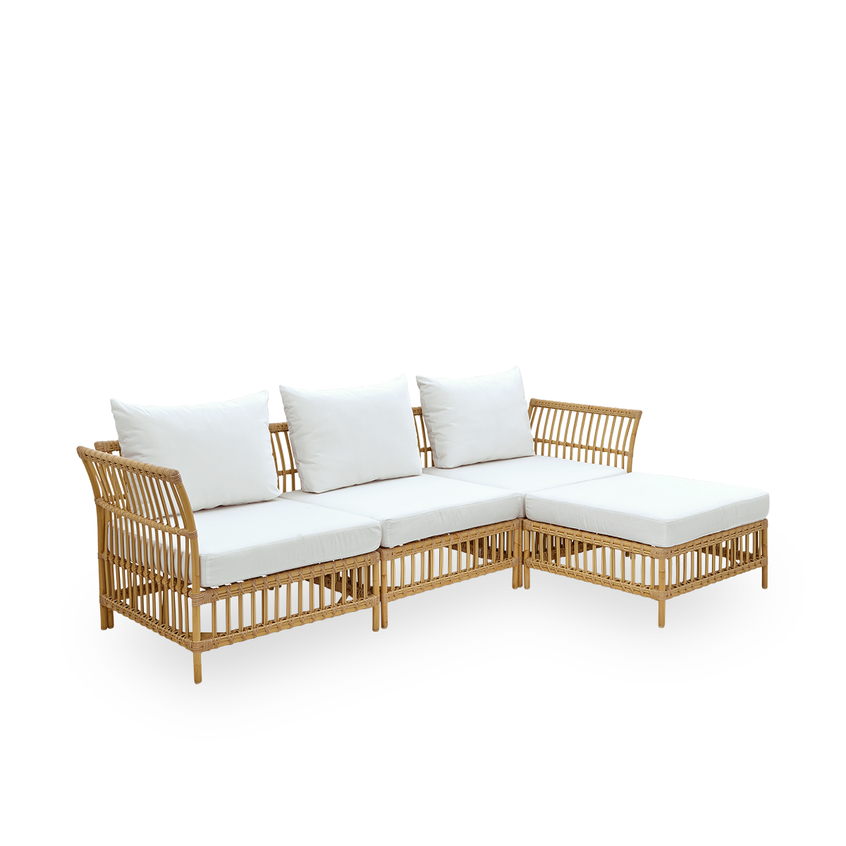 Plain side view of Maggie outdoor sofa corner module in Natural color presented with white seat and back cushion. Aluminium frame with handpainted rattan look with ArtFibre windings.