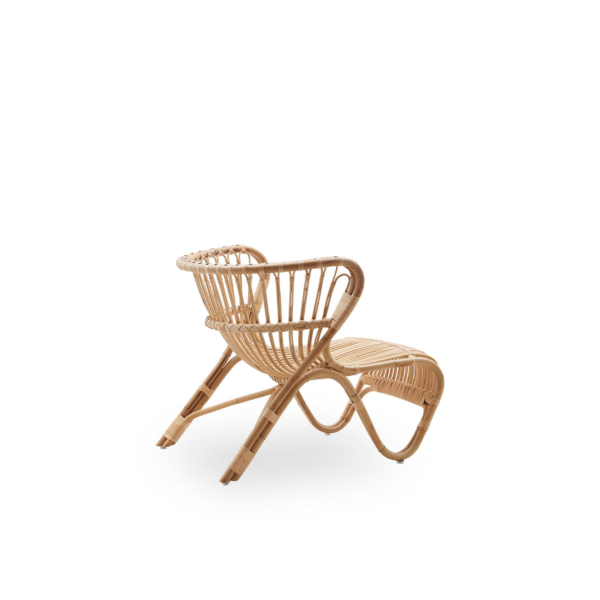 Plain back view of Fox lounge chair in natural rattan color designed by Viggo Boesen. Low curvy wicker lounge chair handcrafted from high-quality Indonesian rattan.