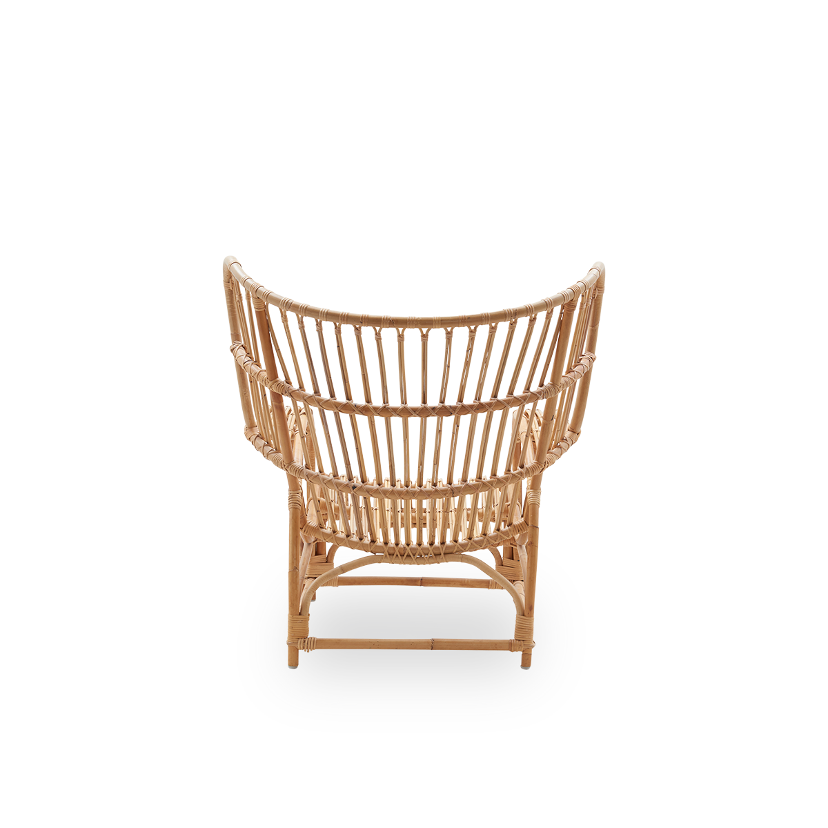 Side view of Teddy lounge chair by Viggo Boesen, big embracing lounge chair inspired by the 19th-century wing chair. Handcrafted from high quality Indonesian rattan