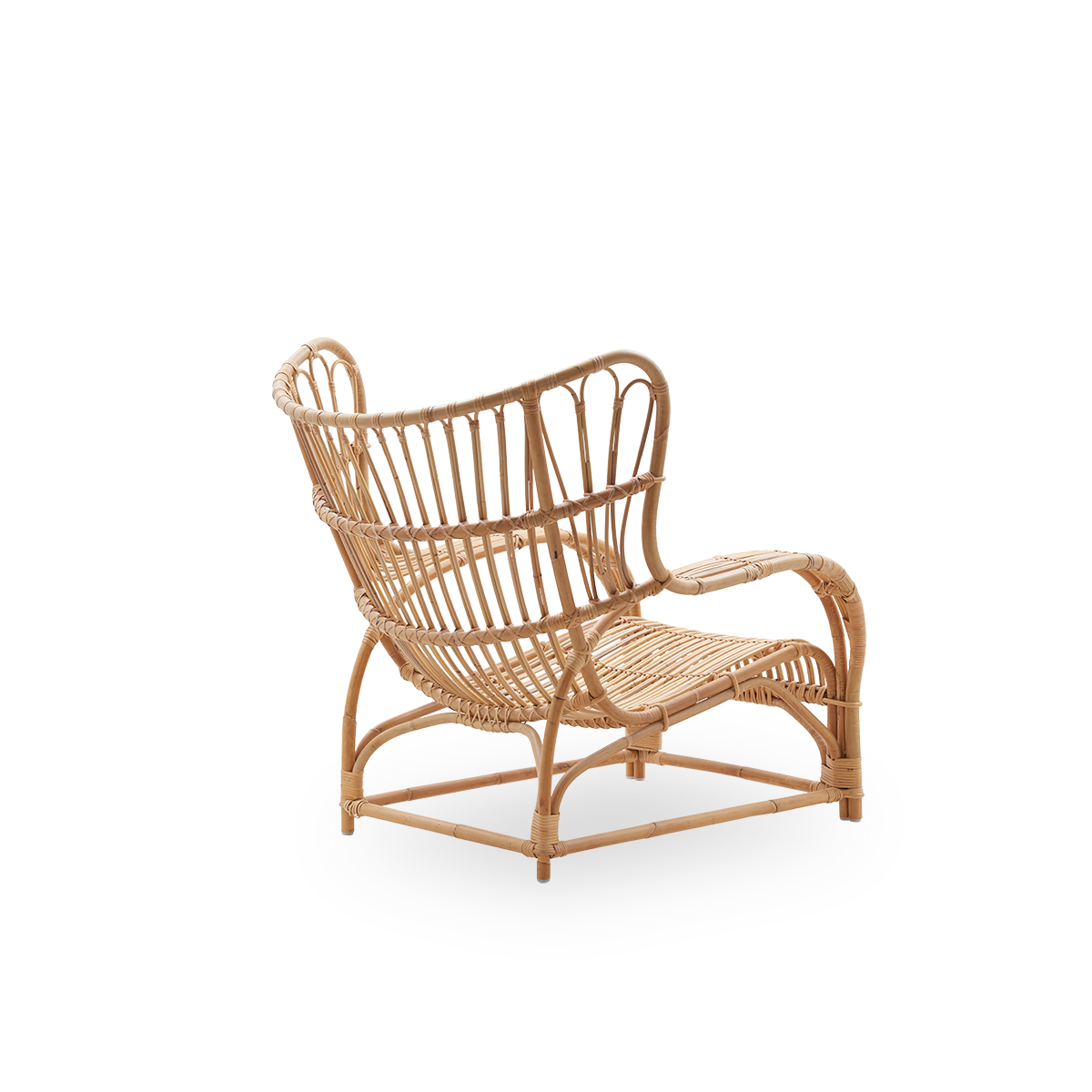 Plain back view of Teddy lounge chair by Viggo Boesen, big embracing lounge chair inspired by the 19th-century wing chair. Handcrafted from high quality Indonesian rattan.