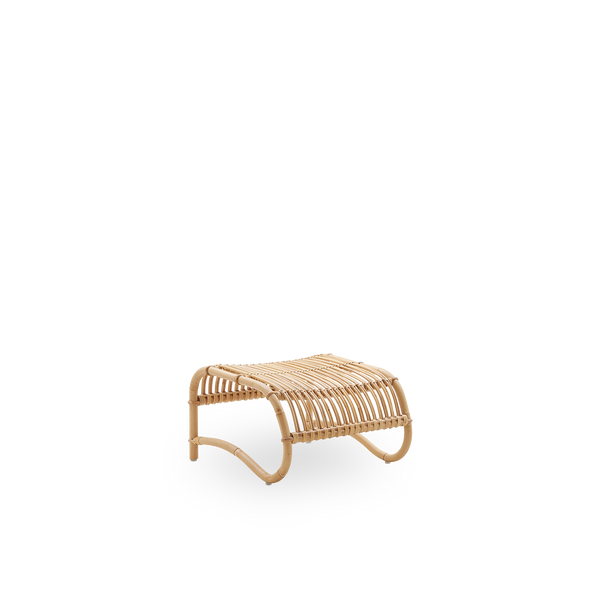 Side view of Teddy rattan footstool designed by Viggo Boesen. Handcrafted in high quality rattan. 