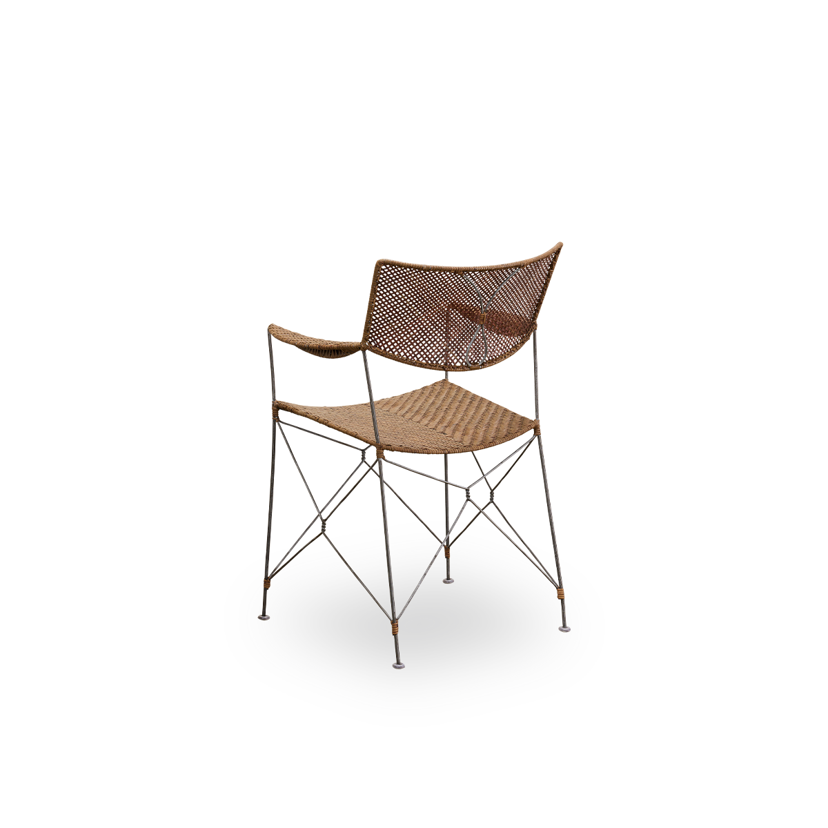 Back side view of the Rap dining chair designed by Yuzuru Yamakawa.
Steel frame with seat and backrest handwoven with Indonesian rattan. Lightweight chair combining Japanese design with traditional Indonesian craftsmanship.