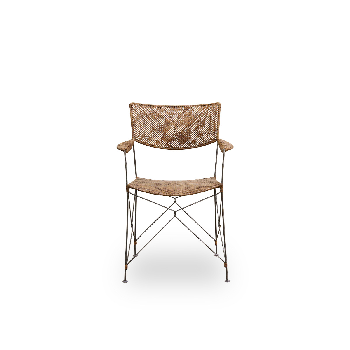 Front view of the Rap dining chair designed by Yuzuru Yamakawa.
Steel frame with seat and backrest handwoven with Indonesian rattan. Lightweight chair combining Japanese design with traditional Indonesian craftsmanship.