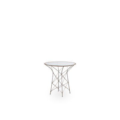 Side view of the Funky café table designed by Yuzuru Yamakawa. The table has a round glass table top and a steel frame which is handwoven with Indonesian rattan in Hazelnut color.